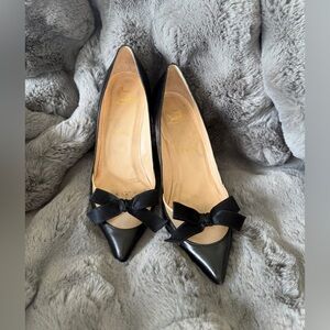 Christian Louboutin black pumps